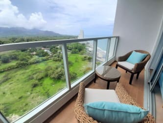Balcony with ocean and mountain views overlooking Playa Malibu from Royal Palm condo in Panama