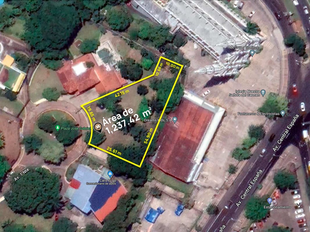 Modern residential tower and landscaped playground adjacent to sale lot in La Cresta Panama City