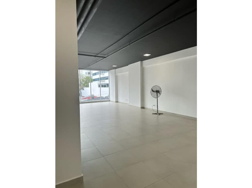 Large open space with natural light through windows, tiled floors in Panama City