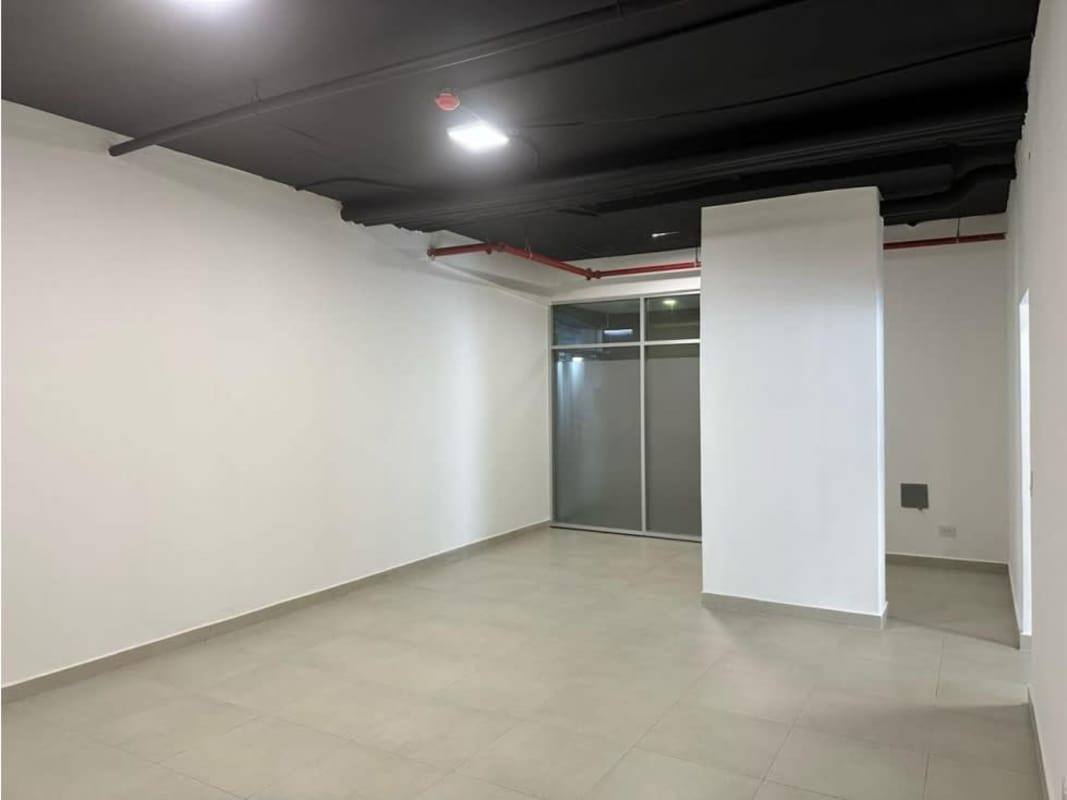 Empty commercial space with black ceiling and glass wall partition in Panama City San Francisco