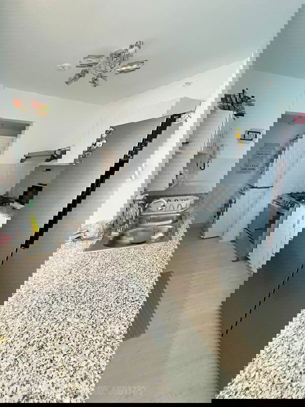 Kitchen with granite, double sink, stainless appliances, washer dryer PH Pueblo Nuevo Panama