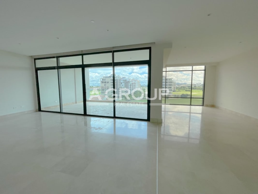 Bright open concept living area with large windows in PH Greenhouse Santa María Panama
