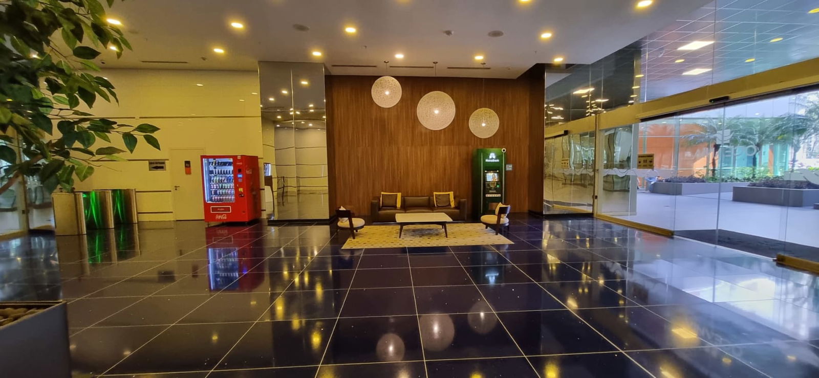 Reception lobby with seating and elevators Panch PH Oceania Business Plaza Panama City