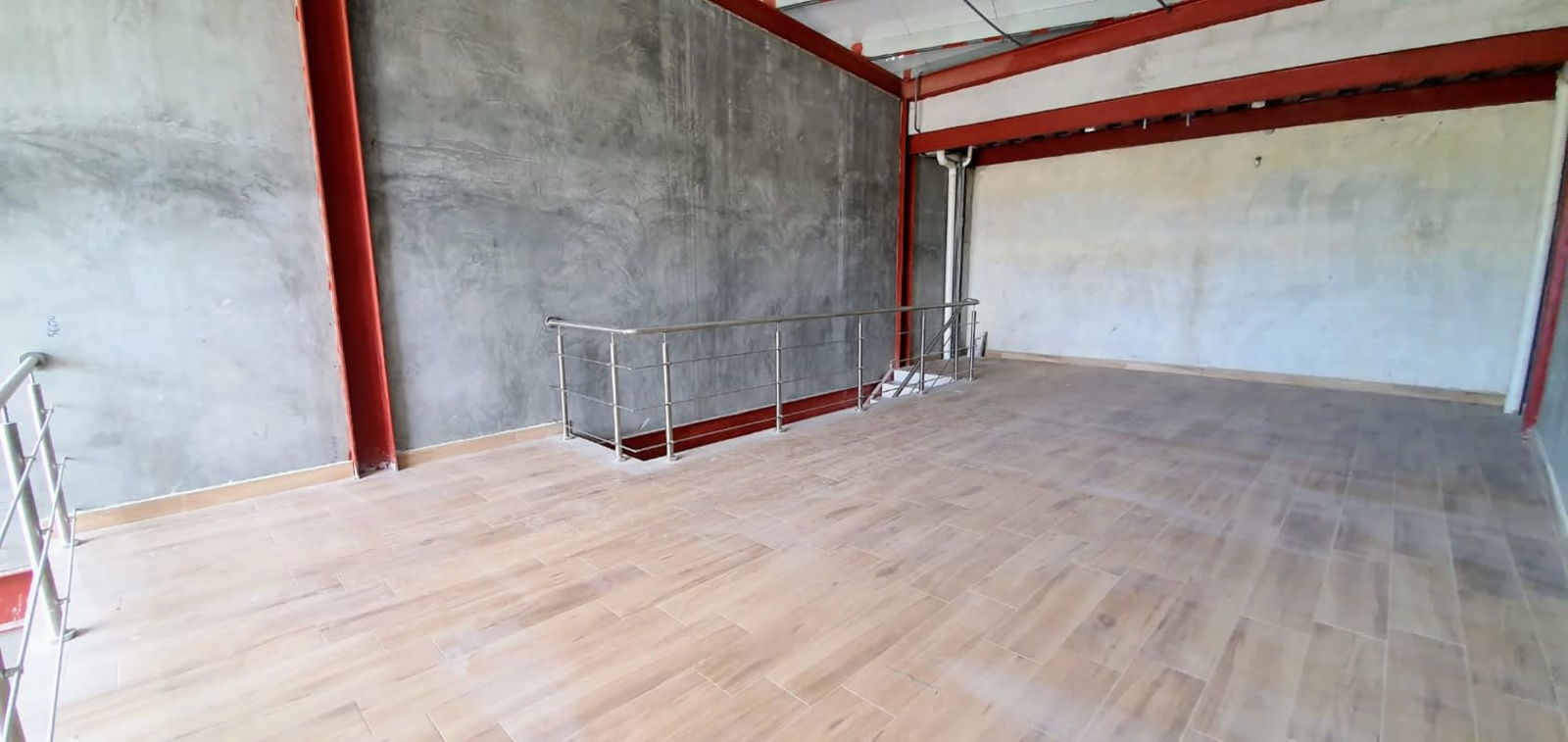 Modern glass facade with vertical gardens at Plaza Midtown commercial center in Betania Panama City