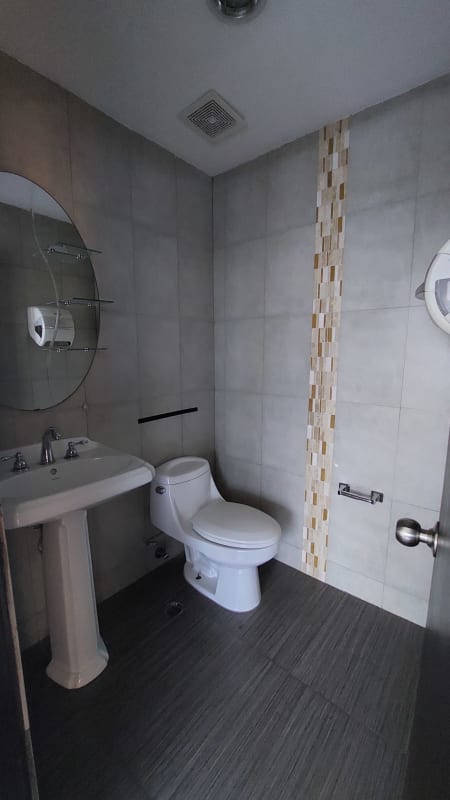 Contemporary bathroom in office tower Torre de Las Americas with elegant tiles and fixtures Punta Pacífica Panama