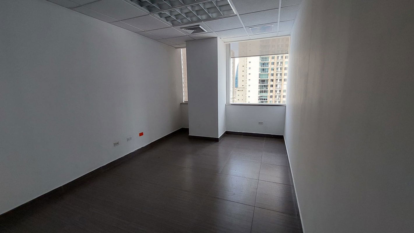 Empty modern commercial office space with large window city views in Torre de Las Americas Punta Pacífica Panama
