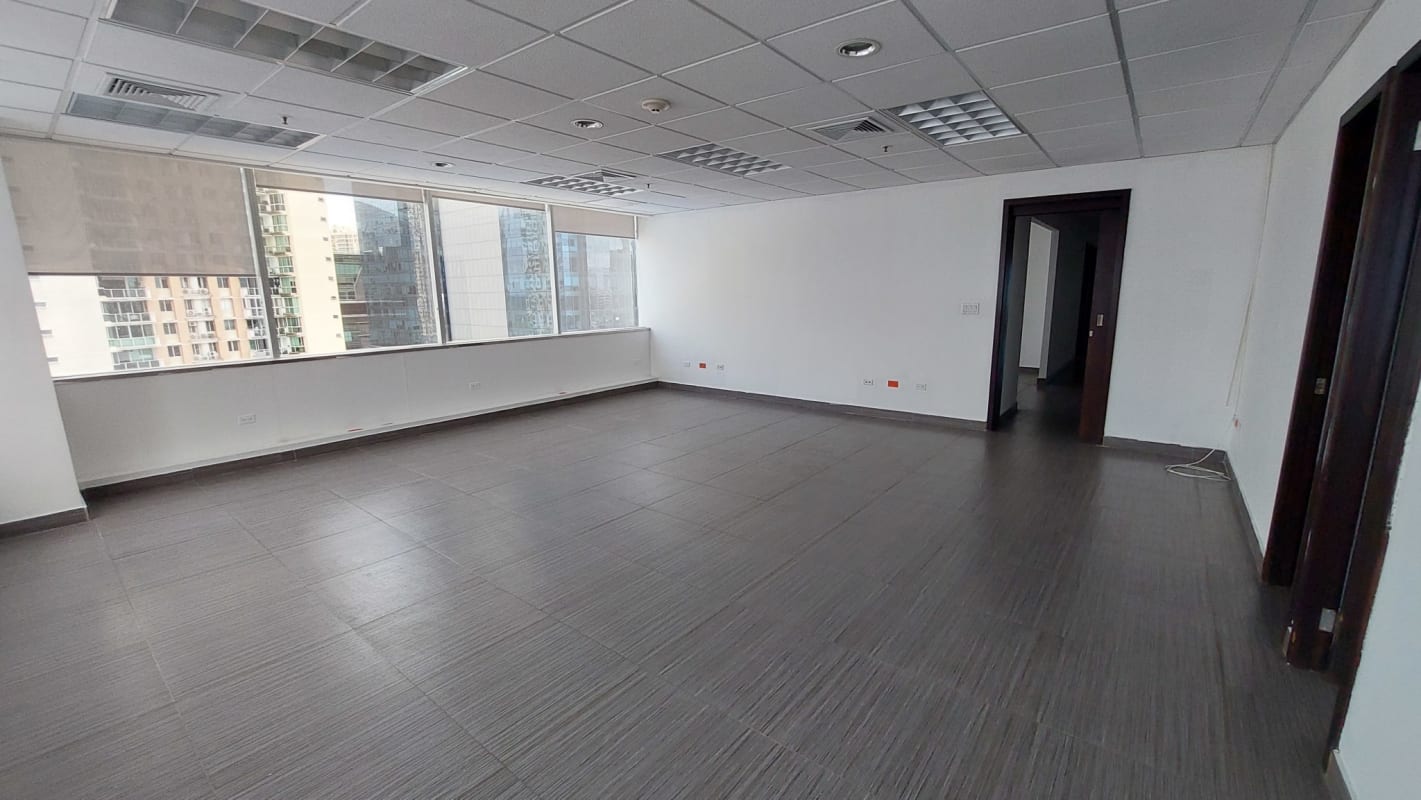 Large empty office space with tiled floor and white walls in Torre de Las Americas Panama