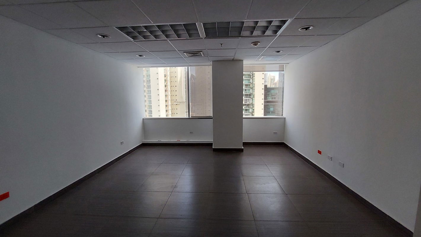 Vacant corner office space with large windows and tiled floors Punta Pacifica Panama