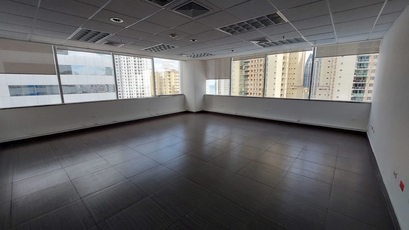Vacant bright office with window blinds tiled floor Torre de Las Americas