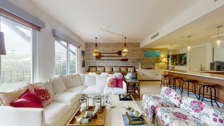 Open kitchen with island stainless appliances at Puerta del Mar Buenaventura Panama