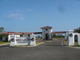Mediterranean style gated entrance to Vista Mar Resort in San Carlos Panama