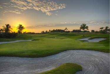 Golf course with sunset view palm trees fairways at Vista Mar Resort Panama