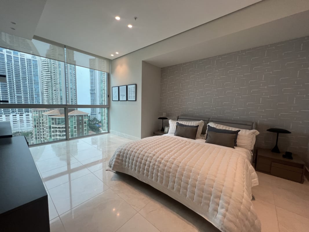 Walk-in closet with modern built-ins in master suite Pacific Point Panama