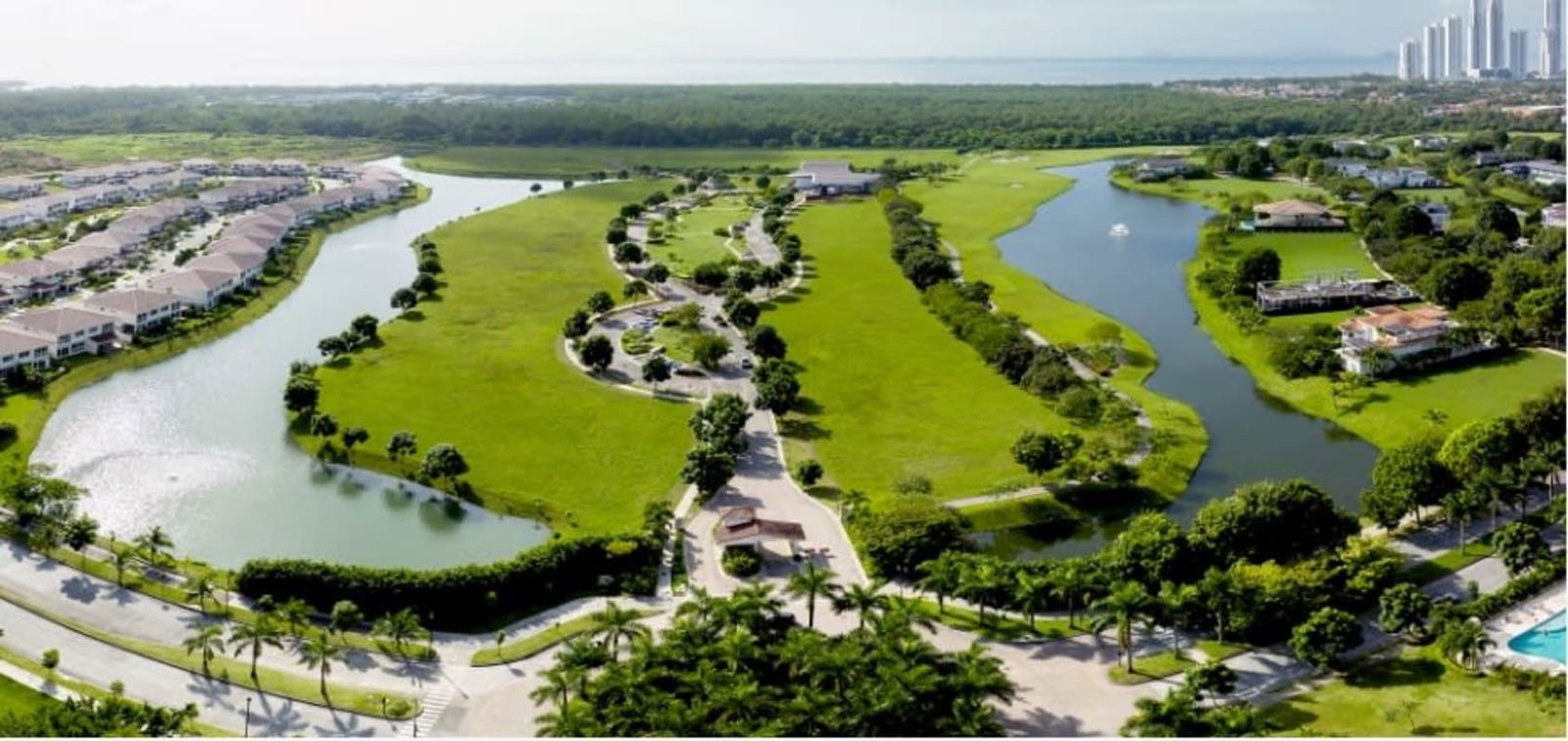 Aerial shot of Nicklaus Design golf course and waterfront homes in Santa María Panama City