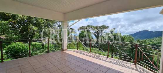 Spacious covered terrace with mountain views in upscale mountain home Altos del María Panama