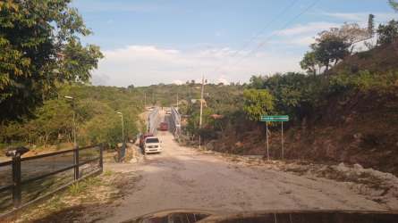 Unpaved rural road with bridge near wooded land Penonomé Panama