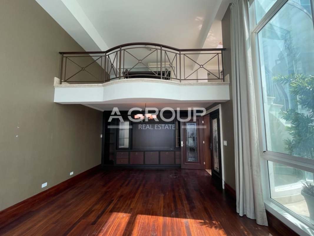 Spacious double-height living room floor-to-ceiling windows Pacific Ocean panorama Punta Pacifica Panama