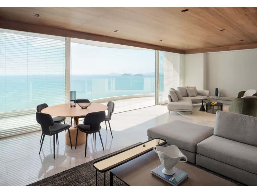 Open concept living dining with panoramic city and ocean views at The Towers Panama