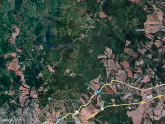 Artificial lakes surrounded by lush vegetation and open fields on development land El Arado Panama