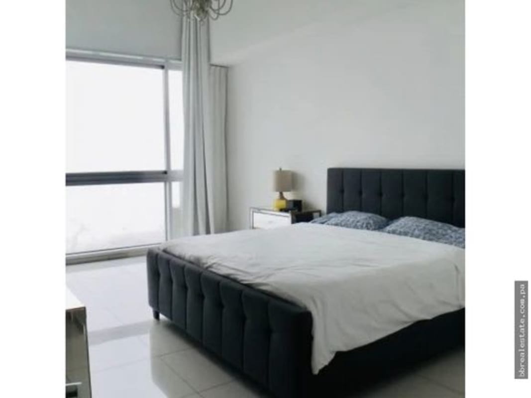 Spacious master bedroom with ocean views walk-in closet ensuite PH Altamar del Este luxury apartment Panama City