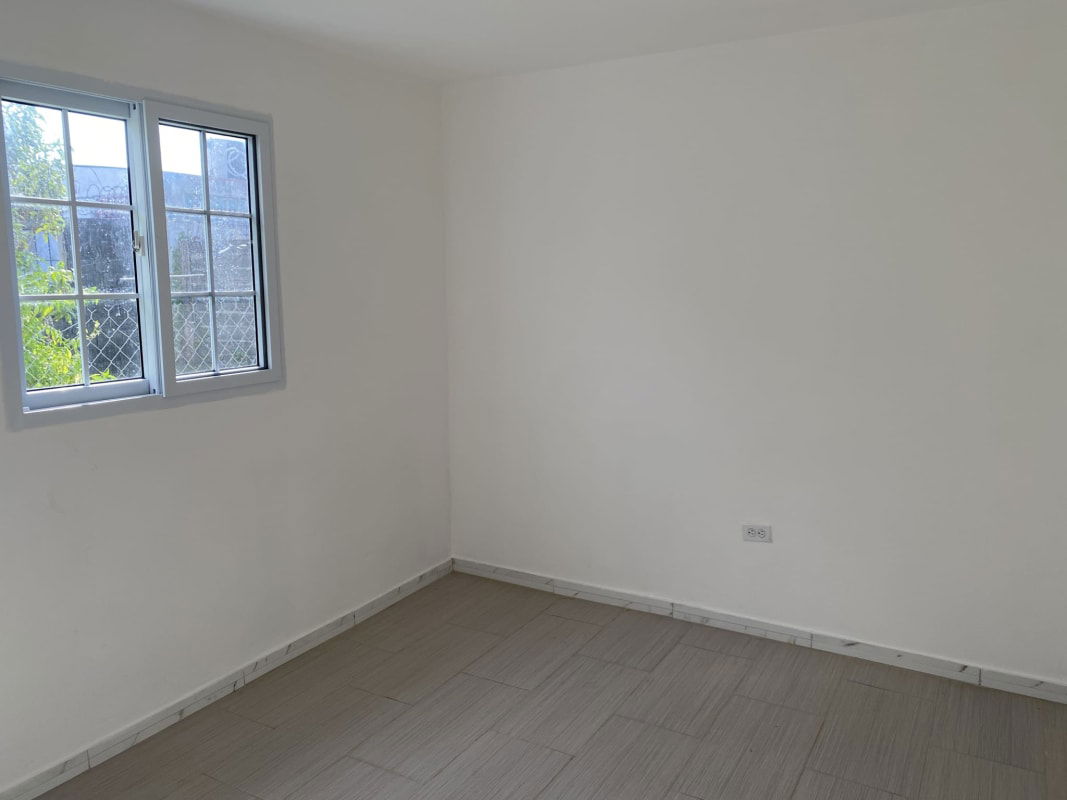 Unfurnished bedroom with ceramic tile floor, sliding window and natural light Tocumen Panama