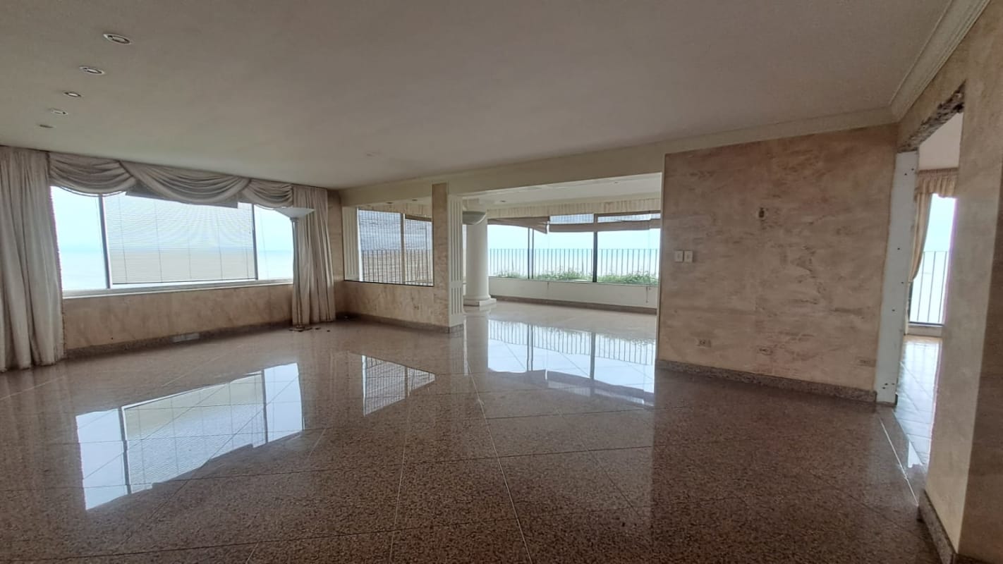 Open luxury penthouse living room with ocean view windows and marble floors PH Sobre Las Rocas Panama City