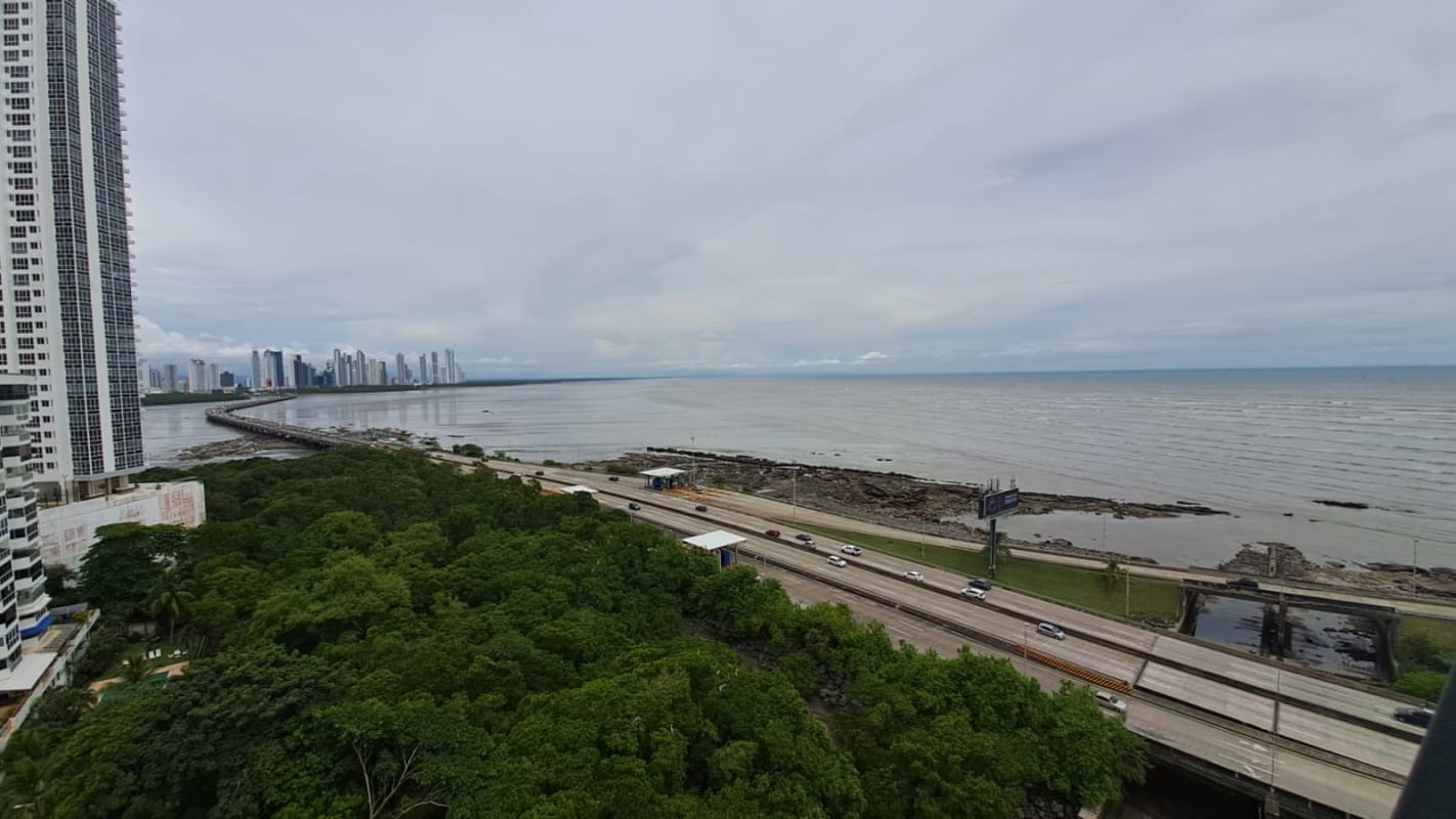 Aerial coastline view Coco del Mar with Panama skyline PH Sobre Las Rocas tower Panama City