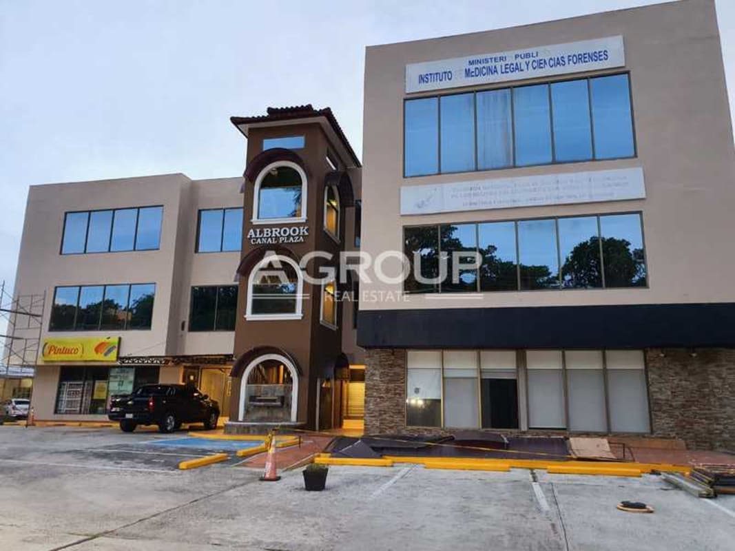 Business center complex with tower entrance parking Albrook Canal Plaza Panama City