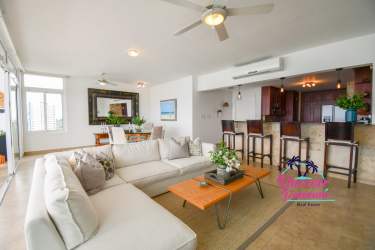 Spacious master bedroom with private balcony sea views in Miramar Loft Panama beach rental