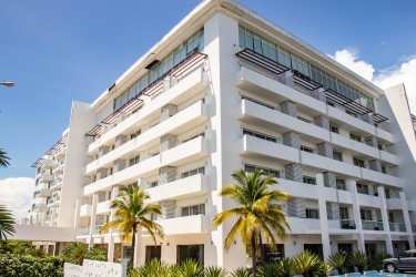 Modern kitchen with breakfast counter and storage PH Town Center Playa Blanca