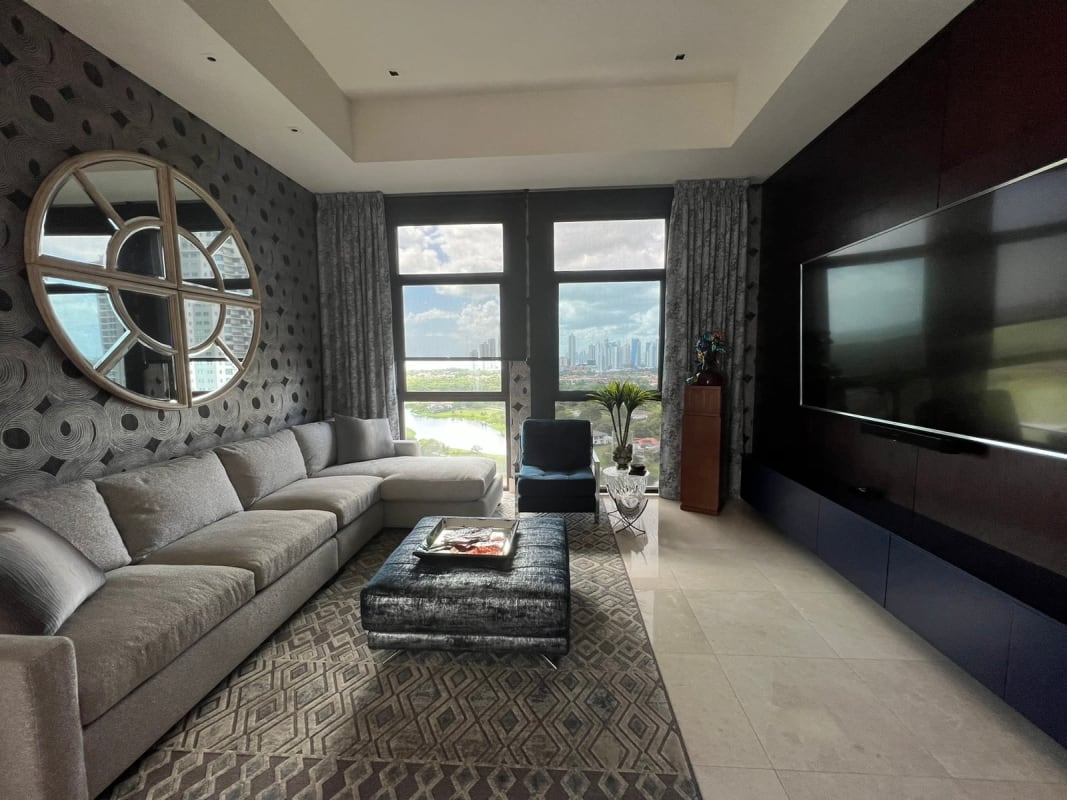 Elegant dining area with marble floors and panoramic windows at PH Ocean House Penthouse Santa Maria Panama