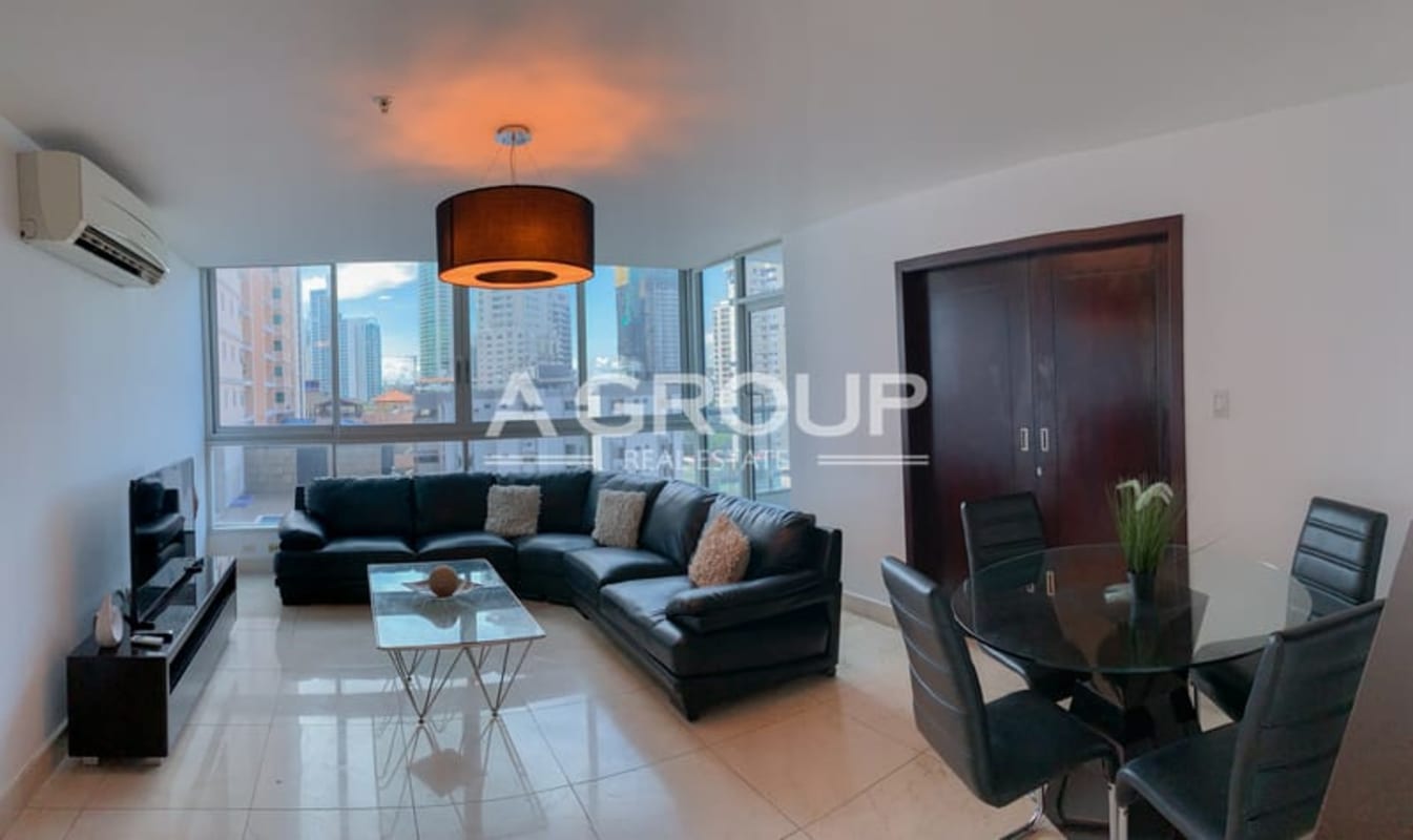 Modern open-plan kitchen with dining area in furnished apartment PH Villa del Mar Panama City