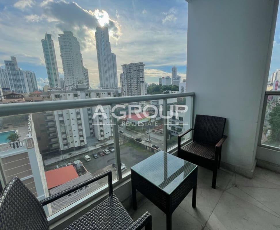 Glass balcony with panoramic oceanfront city views at PH Villa del Mar Avenida Balboa apartment rental