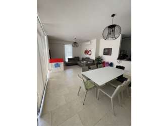 Large living and dining area with panoramic beach view at PH Mareas Beach Club Coronado Panama apartment for sale