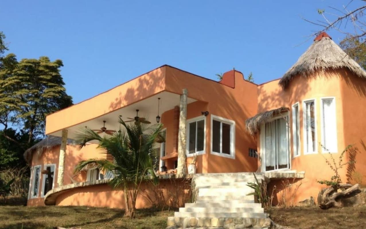 Spectacular sandy cove with rocks turquoise waters peaceful island beach for sale Isla Saboga Las Perlas Panama