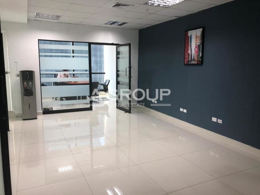 Glass partitioned office units with tiled floors inside Tower Financial Center Panama