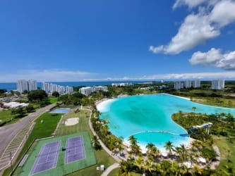 Spacious master bedroom furnished with sea views large windows PH Waterways Playa Blanca Panama
