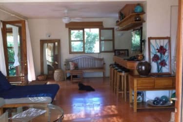 Two-story yellow beachfront house with balconies, gardens Azueros Ocean Loft Pedasi Panama