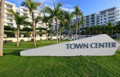 Bright bathroom with shower, vanity, large mirror in Playa Blanca Town Center studio rental