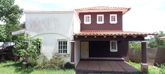 Spacious living area with sliding glass doors, staircase, tiled floors in The Hill Top Veracruz Panama