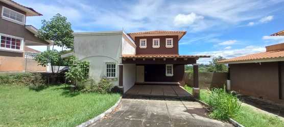 Bedroom with neutral walls, large window and tiled floor in The Hill Top Veracruz Panama