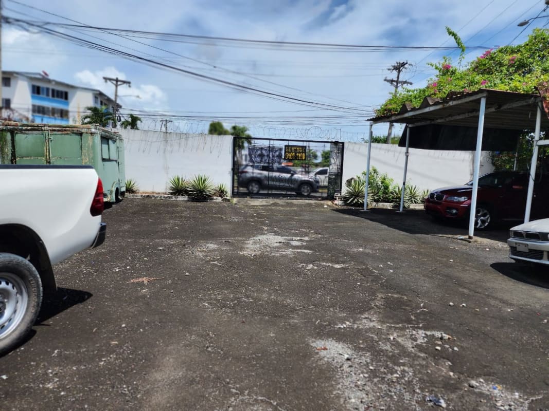 Mid-century style kitchen with white cabinets, patterned linoleum floor Parque Lefevre Panama City