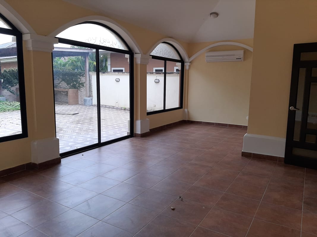 Large living and dining room with natural lighting ceramic floors Costa Sur Panama