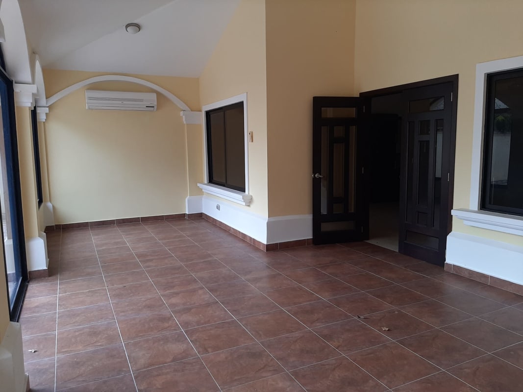 Empty bedroom with large window, closet and ensuite bathroom Costa Sur Panama