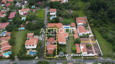 Private outdoor swimming pool with lounge terrace at Coronado beach home