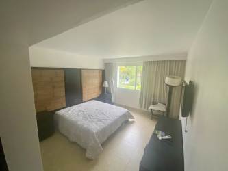 Equipped modern kitchen with granite island and appliances in Nikki Beach Residences Rio Hato