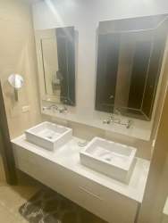 Bathroom with double vanity and vessel sinks in Nikki Beach Residences Panama