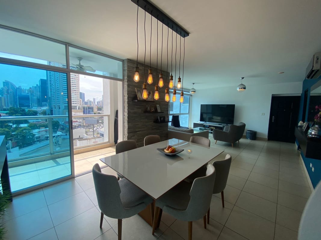 Bright modern living dining area large windows city views in PH SF67 San Francisco Panama