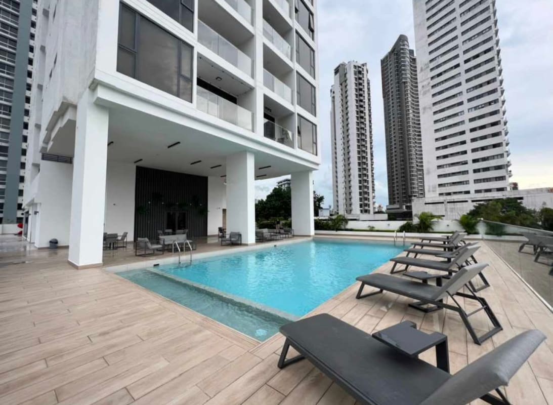 Modern bedroom with wooden tile and closet at PH Sky Swiss El Cangrejo Panama