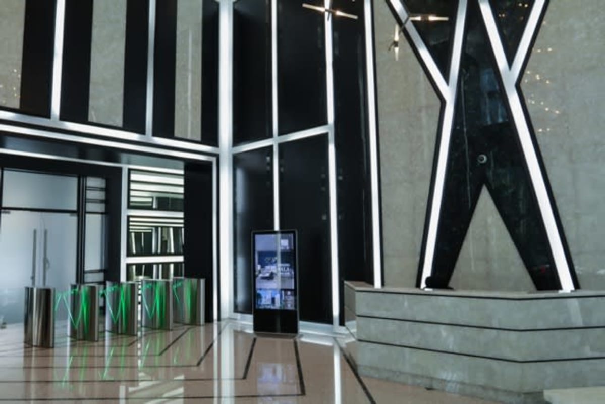 Modern glass skyscraper Evolution Tower in Obarrio with skyline reflections Panama City